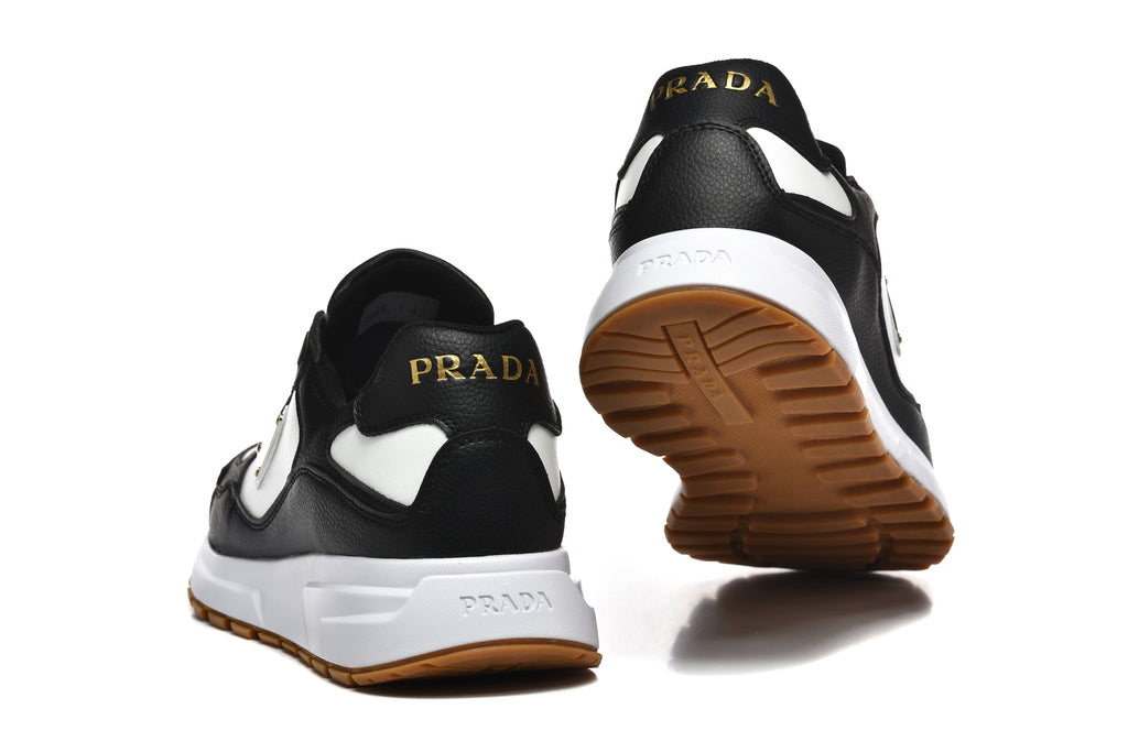 Prada Perforated-Toe Sneakers – Black, White & Gum