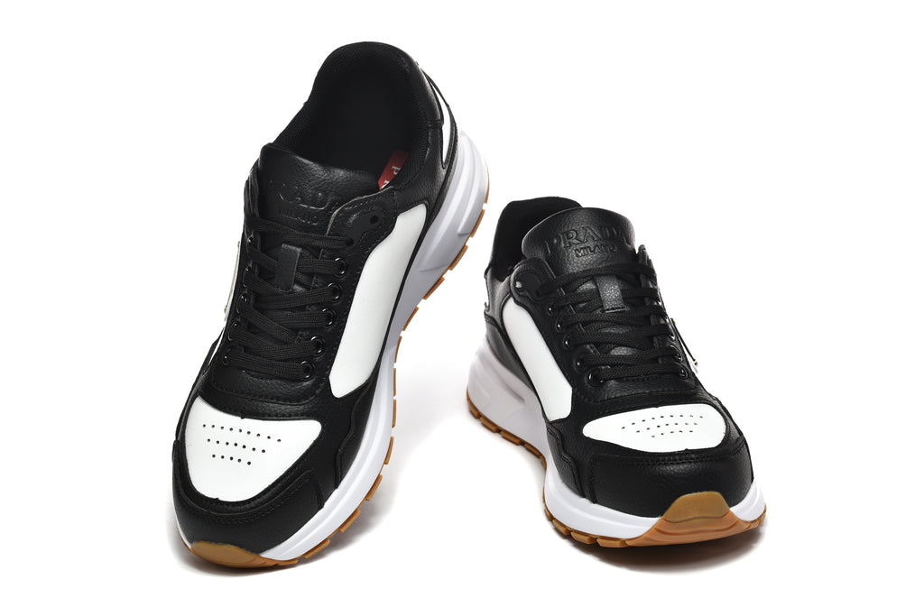 Prada Perforated-Toe Sneakers – Black, White & Gum