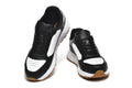 Prada Perforated-Toe Sneakers – Black, White & Gum