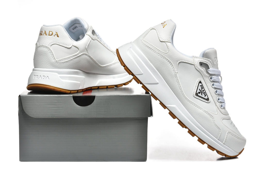 Prada Perforated-Toe Sneakers – White & Gum