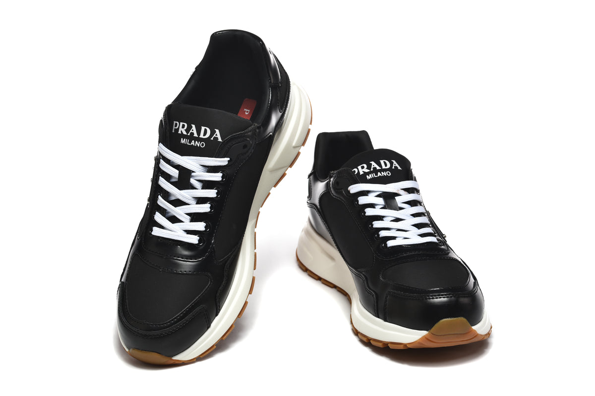 Prada Low-Top Sneakers – Black, White & Gum