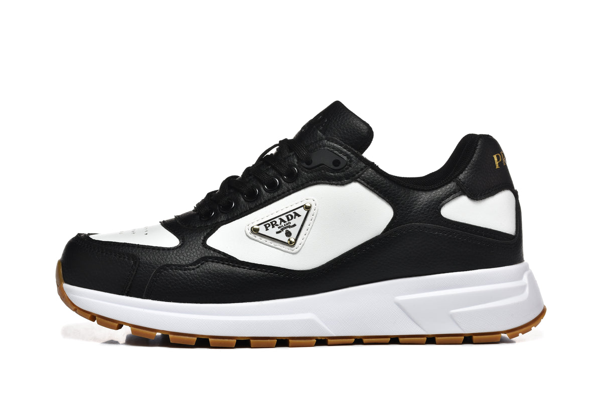 Prada Perforated-Toe Sneakers – Black, White & Gum