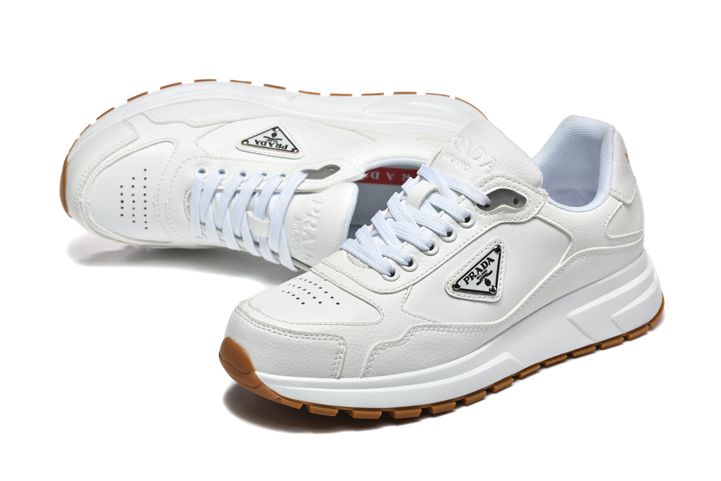 Prada Perforated-Toe Sneakers – White & Gum