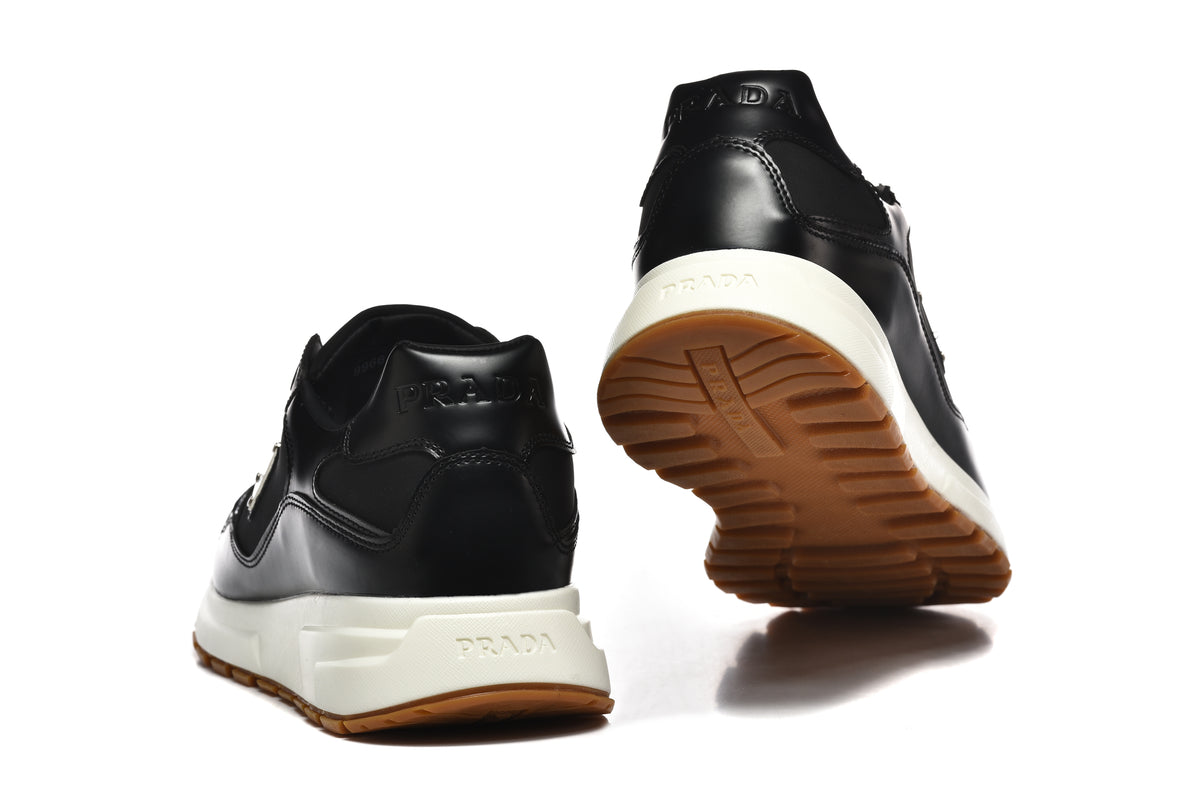 Prada Low-Top Sneakers – Black, White & Gum