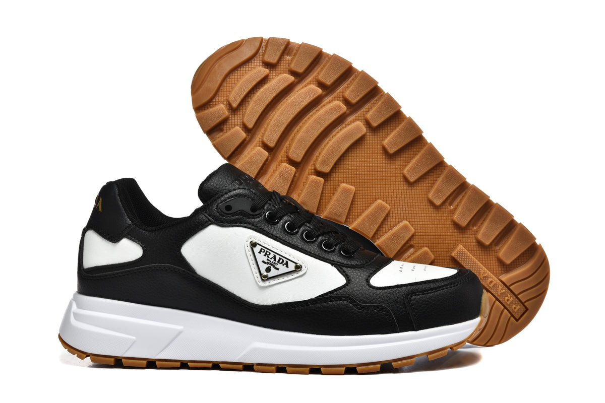 Prada Perforated-Toe Sneakers – Black, White & Gum