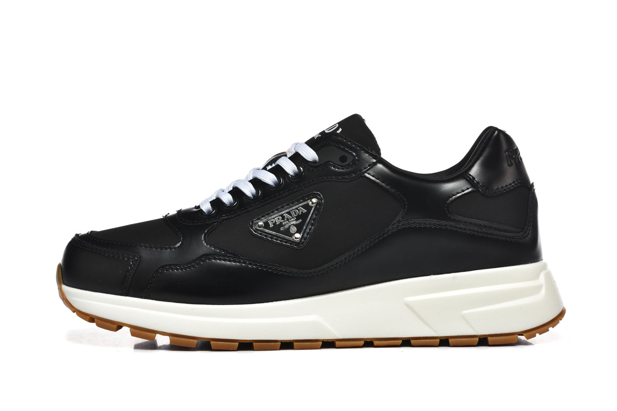 Prada Low-Top Sneakers – Black, White & Gum