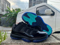 Jordan 11 Low-Top Sneakers | Black & Gamma Blue