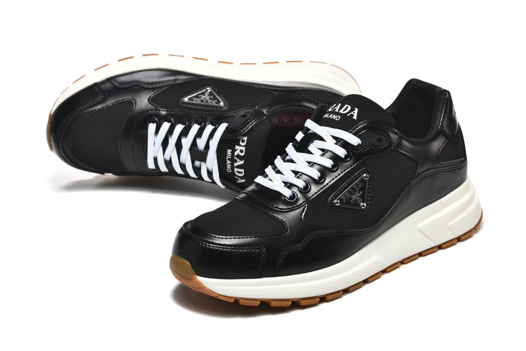Prada Low-Top Sneakers – Black, White & Gum
