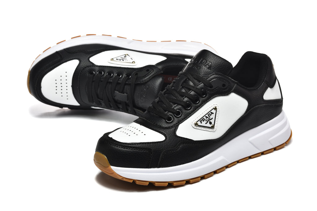 Prada Perforated-Toe Sneakers – Black, White & Gum