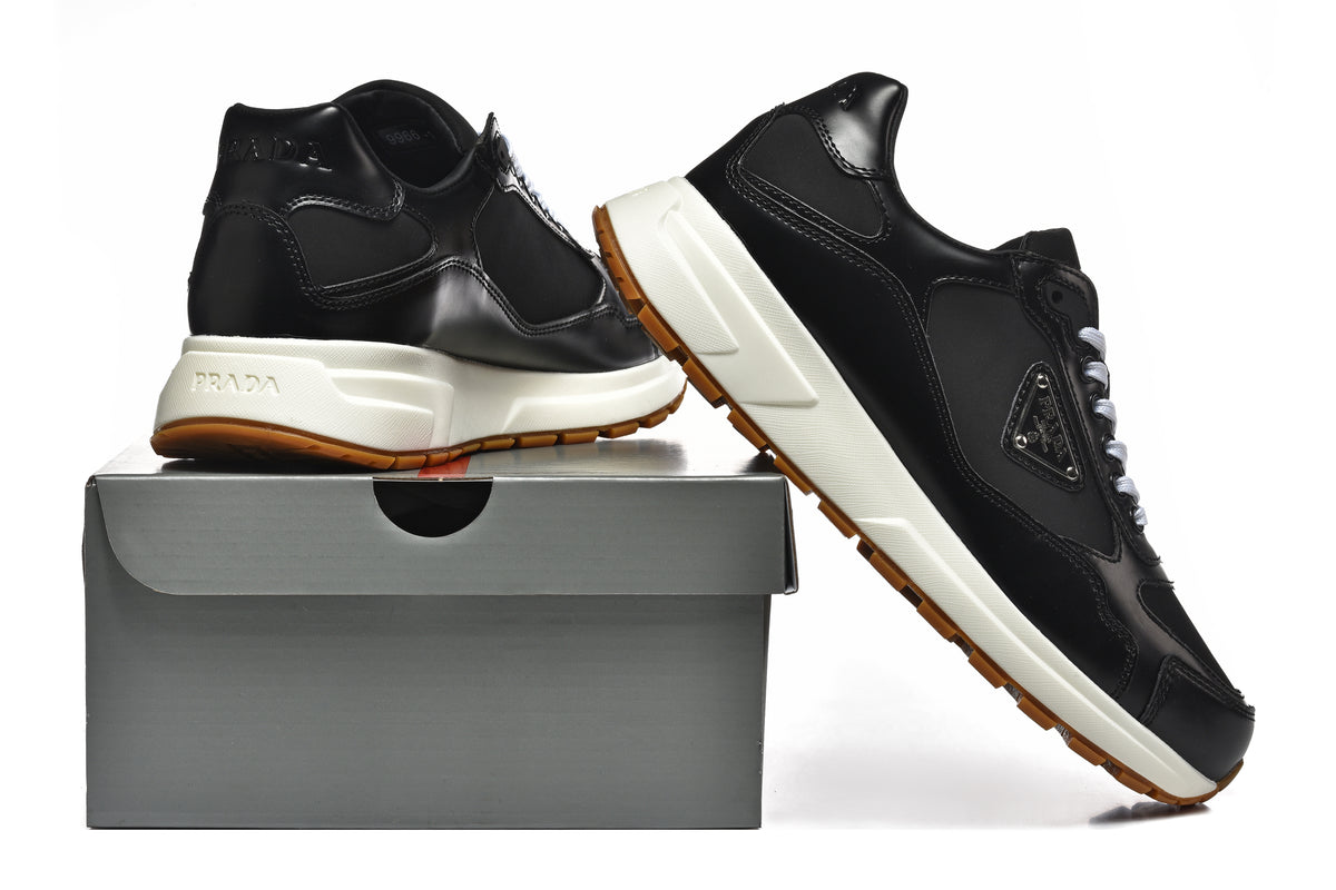Prada Low-Top Sneakers – Black, White & Gum