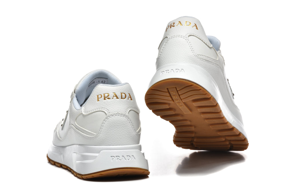 Prada Perforated-Toe Sneakers – White & Gum